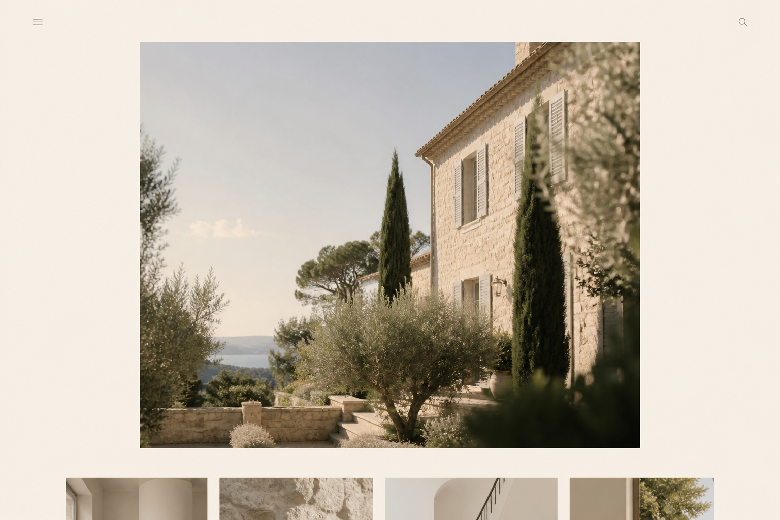 Ivory template study — cream editorial homepage with limestone house